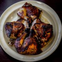 Whole Chicken · All natural chicken, marinated in our Peruvian​ spices and cooked to golden perfection in ou...