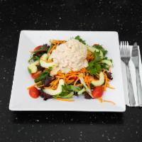 Tuna Salad Platter · Traditional tuna salad, cherry tomatoes, shredded carrots and sliced cucumber served over mi...