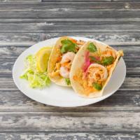 SHRIMP TACOS ( 2 tacos ) · slaw, pickled onion and salsa roja in flour tortillas.