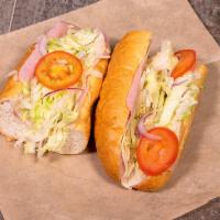 Ham and Provolone Cold Sub · Comes with lettuce, tomato and Italian dressing.