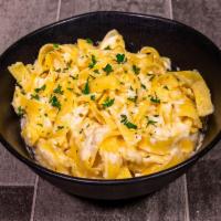 Fettuccini Alfredo with Chicken · Comes with bread and side pasta.