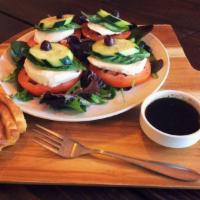 Caprese Salad · Organic spring mix, sliced tomato, fresh mozzarella, fresh basil, Kalamata olives with balsa...