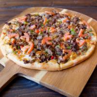 Philly Steak Pizza · Mixed blend cheese, Philly steak meat, sautéed onions, green bell pepper, and special house ...