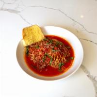 Spaghetti Bolognese · Spaghetti pasta with our homemade bolognese sauce.