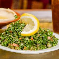 Tabouleh Salad · A refreshing parsley salad mix of bulgur wheat, fresh tomatoes, onions, fresh mint, lemon, s...