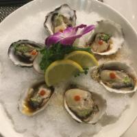 Kumamoto Oyster · 1/2 dozen live kumamoto oyster served with hot radish ponzu sauce.