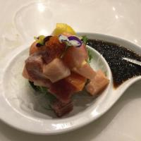 Trio dice bowl · Diced tuna ,salmon,yellowtail,tobiko and spicy mayo mixed with seaweed salad,bottom with hal...