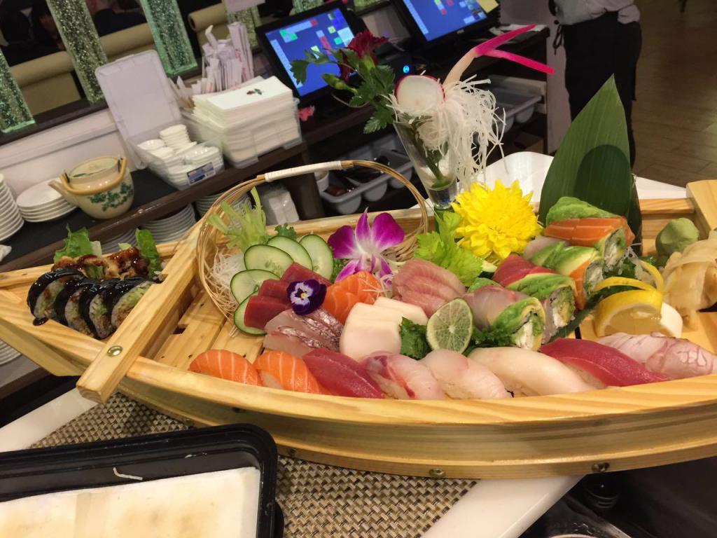 Lover Boat For 2 · 10 pieces of sushi, 18 pieces of sashimi and spider roll and rainbow roll. Comes with choice of side.
