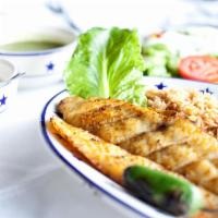 Fish Kabab · Grilled salmon fish marinated in special Alibaba spices. Served with rice, bread and house s...