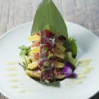 Pepper Tuna Wrap · Spicy kani salad and cucumber wrapped with pepper tuna.