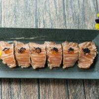 Salmon Carpaccio · Salmon with honey wasabi sauce. 