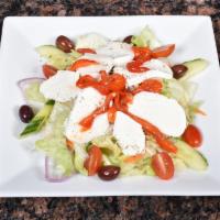 Tossed Salad · Fresh mozzarella, red roasted peppers, tomatoes, cucumbers and black olives.