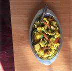 Aloo Gobhi Masala · Cauliflower and potatoes cooked with herbs and spices. Vegetarian.