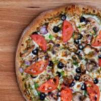 Pesto Chicken Pizza · Pesto sauce, sun-dried tomato, chicken, mushrooms, green peppers, onions, black olives and t...