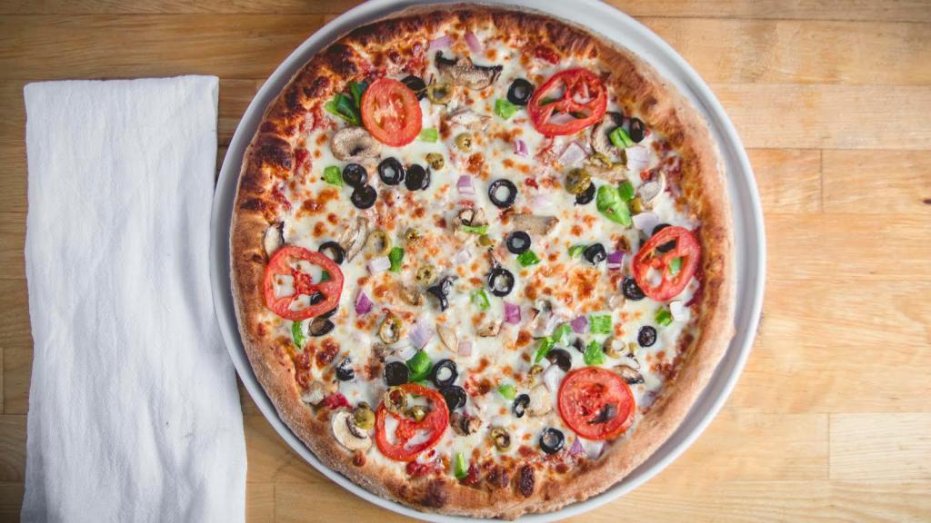 Veggie Pizza · Mushrooms, onions, green peppers, black and green olives and fresh tomatoes.