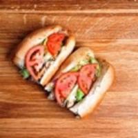 Grilled Chicken Sub · Chicken, mozzarella, mayo, green peppers, onions, lettuce and tomatoes.