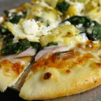 Florentine Flatbread Pizza · Artichoke hearts, red onion, spinach, parmesan, feta, mozzarella, marinara
