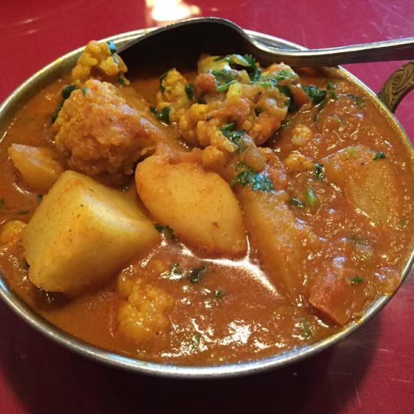 20. Aloo Gobi · Potatoes and cauliflower cooked with onion and tomato sauce with Himalayan herbs and spices. Vegetarian.
