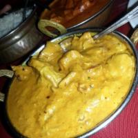 41. Chicken Korma · Boneless chicken cooked with coconut milk, creamy sauce and Himalayan herbs and spices.