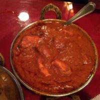 46. Chicken Tikka Masala · Boneless chicken breast cubes cooked in a creamy onion and tomato sauce with Himalayan herbs...