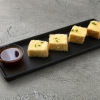 4 Pieces Teriyaki Tofu · Deep fried tofu with teriyaki sauce, bonito and green onion.  