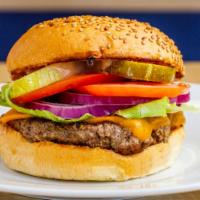 Cheeseburger · 1/3LB Hand-Made Lean USDA Beef, cheddar cheese, crisp lettuce, red ripe tomato slice, sliced...