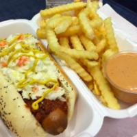Southern Dog · Includes mustard, our homemade chili and coleslaw, and freshly chopped onions.