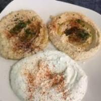 Dip Sampler · Smaller portions of hummus, baba ghanouj and tzatziki. Served with pita bread.