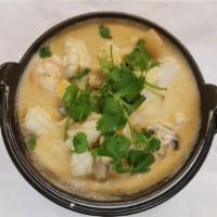 Tom Kha Mixed Seafood Soup · Spicy and sour with coconut milk, mushroom, lemon grass, galanga, kaffir lime leaf and cilan...
