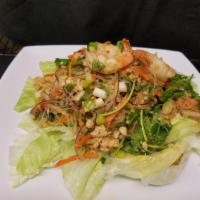 Silver Noodle Prawn Salad · Sliver noodle, grilled prawns, ground chicken, onion, fresh mint and mixed Thai special spic...