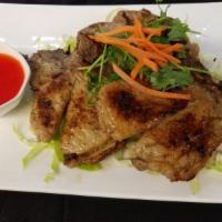 Pepper Garlic Pork Chop · Marinated with palm sugar and Thai BBQ sauce served with fried vegetable.