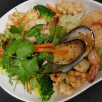 Garlic Seafood · Sauteed mixed seafood with garlic, black pepper and broccoli. All dishes are mix of prawns, ...