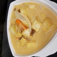 Massaman Peanut Curry · Massaman curry paste with coconut milk, peanut, potatoes, carrots and yellow onions.