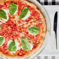Margherita Pizza · Pizza sauce, Roma tomato, fresh mozzarella, basil, extra virgin olive oil. Made with homemad...