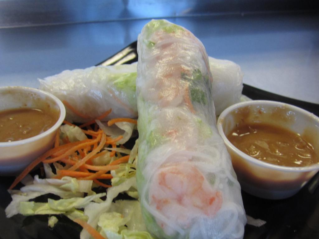 Shrimp Spring Roll (2 pcs) · 2 rolls. Soft rice paper roll, shrimp, rice vermicelli noodle, cilantro and carrots.
