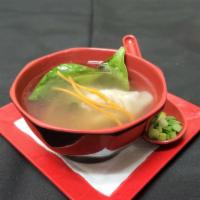 Wonton Soup · Vegetable broth, 2 pcs wontons (chicken fillings), spinach, carrots, and green onions.