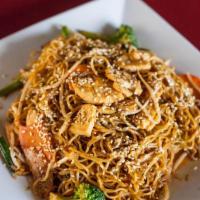 Spicy Ramen Stir Fry · Ramen  noodles, broccoli, carrots, sesame seed, bean sprouts, yellow and green onions.