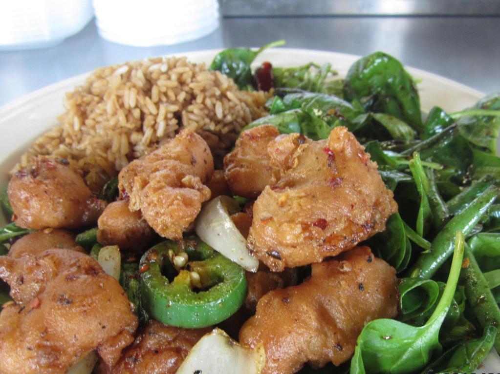 Chef's Special Jalapeno Pepper Chicken · Crispy chicken breast, Jalapeno, yellow & green onion. Serves with spinach, tossed green beans with bacon and choice of rice. Spicy.