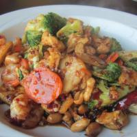 Kung Pao · Broccoli, carrots, peanuts, water chestnuts and peppered sauce. Spicy.