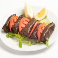 Stuffed Grape Leaves · Yalanci dolma. Grape leaves delicately flavored with rice and herbs. 