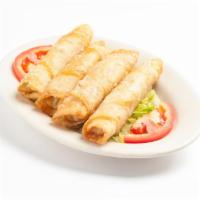 Cheese Roll · Phylo scrolls stuffed with feta cheese and pan fried until golden brown. 