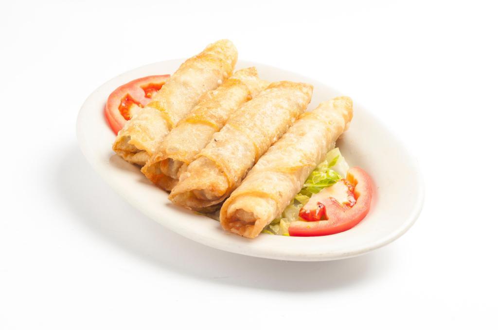 Cheese Roll · Phylo scrolls stuffed with feta cheese and pan fried until golden brown. 