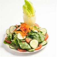 Green Salad · Yesil salata. Mixed green with fresh cucumbers, green peppers, tomatoes, onions and carrots. 