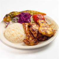 Chicken Chops · Grilled chicken chops. Served with rice and vegetables.