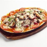 Octopus Casserole · Ahtapot guvec. Fresh octopus baked in a casserole with mushroom, fresh tomatoes, red bell pe...