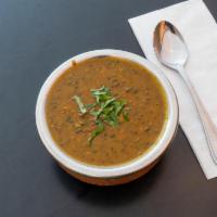Daal Makhni · Lentils cooked with onion, tomatoes, garlic and special spices. 