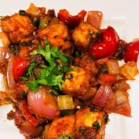 Shangai Chilli Paneer · Paneer (Indian Cottage Cheese) sauteed with onions, bell peppers, spices, chillies & herbs.