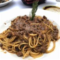 Spaghetti Alla Bolognese · Spaghetti with meat sauce.