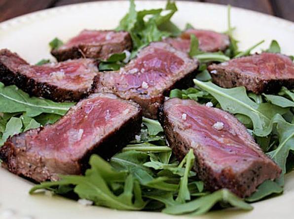 Tagliata Casa Nostra · Sliced prime New York steak topped with arugula and shaved Parmesan cheese.