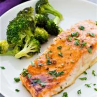 Salmone Alla Griglia · Grilled salmon with lemon caper sauce served with steamed broccoli.
